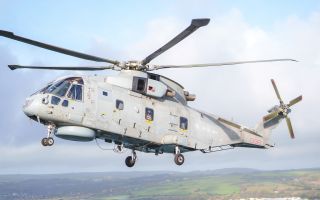 The challenge of lifting the guns from the island's castle to nearby Marazion fell to the crew of Atlantic Flight from 814 Naval Air Squadron (Picture: West Penrith Photography)