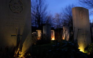 Candlelit graves at Stonefall war graves site