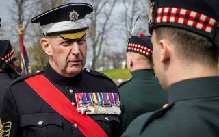 Garrison Sergeant Major Vern Stokes casts his eye over the soldiers -  he's responsible for ensuring ceremonial proceedings go off without a hitch and ensuring professional standards are maintained