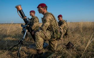 The maroon beret and para wings are intrinsic to the Parachute Regiment, whether or not the airborne soldiers are deployed by chute or by helicopter