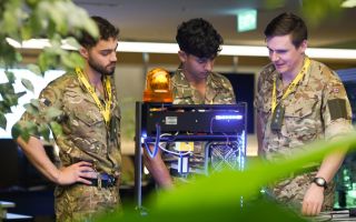 Royal Corps of Signals soldiers discuss their approach to one of the demanding scenarios