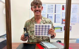 Corporal Samuel Stock of the Royal Logistic Corps says the items that personnel miss most that get sent out to them from home include toilet rolls and sweets (Picture: BFBS)