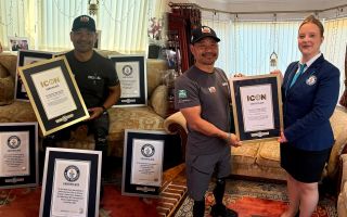 His other records include becoming the first double above-knee amputee to summit other major peaks (Picture: Guinness World Records)