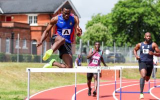 Private Nurudeen Ninfa jumping over hurdles while representing the Adjutant General Corps (Picture: Alligin Photography)