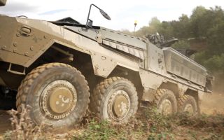 The Army's new Boxer mechanised infantry vehicle shows off its impressive off-road capability at the Defence Vehicle Dynamics exhibition at Millbrook (Picture: BFBS)