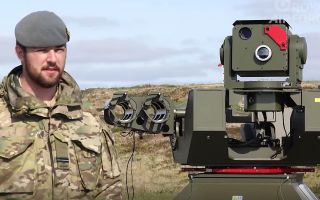 Flying Officer Will Pickles explains how the Rapid Sentry air defence system works - the launcher has not yet been loaded with Lightweight Multirole Missiles