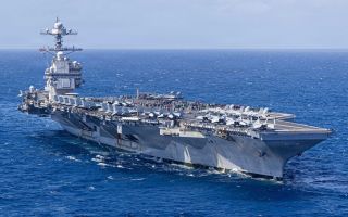According to senior US officials, the aircraft carrier will be docked at the Naval Support Activity Souda Bay for more than a week
