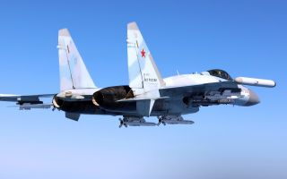 Russian Su-35s - including this one - and Su-27 jets flew alongside an RAF Rivet Joint over the Black Sea, coming as close as six metres of the Rivet Joint's nose, disabling its autopilot CREDIT MOD
