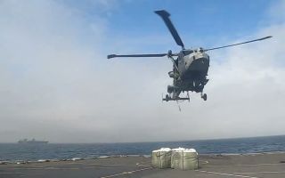 HMS Duncan is resupplied from HMS Prince of Wales 