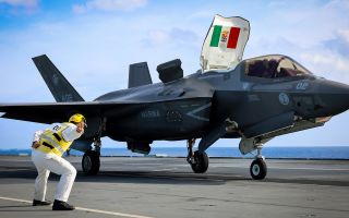 An Italian navy F-35B launches from the flight deck of HMS Prince of Wales to take part in Exercise Neptune Strike