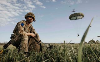 This man from B Company, 2nd Battalion, The Parachute Regiment, packs away his chute after jumping from an RAF A400M, but it looks like some of those who come after him will not get the chance to do the same