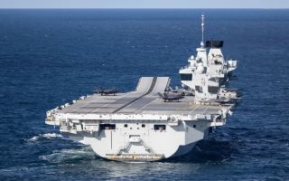 Tobias Ellwood did circles in a plane at roughly a thousand feet around the 65,000-tonne aircraft carriers (Picture: MOD)