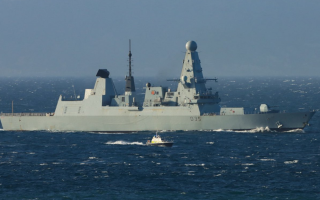 HMS Dragon was pictured arriving in Gibraltar in choppy seas on 17 March 