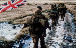 020426 'The Yomper' taken of Corporal Robinson, 45 Commando, yomping to Port Stanley during the Falklands War CREDIT Pete Holdgate