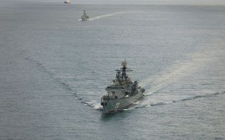 Last year, HMS Iron Duke shadowed the Russian frigate Neustrashimy (foreground) through the English Channel (Picture: MOD)