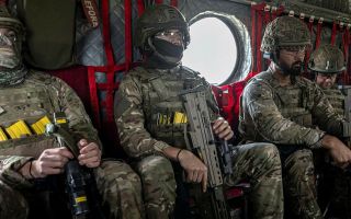 RAF Regiment personnel on board 27 Sqn Chinook, taking part in Exercise Cobra Warrior (Picture: MOD)