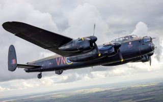 Avro Lancaster PA474 from the Battle of Britain Memorial Flight takes flight over RAF Brize Norton - the war ended before PA474 was deployed and she did not see combat