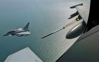 The crew of a two-seat Typhoon observe the firing of a rocket fitted with the Advanced Precision Kill Weapon System, turning it into a guided missile (Picture: MOD)