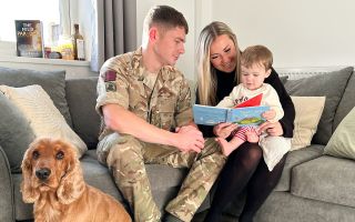 Corporal Crean, Nina and Charlie in their renovated home