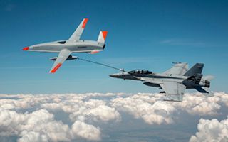 MQ-25 refueling a US Navy FA 18 Super Hornet, the first time an unmanned aircraft has refueled another aircraft (Picture: Boeing)