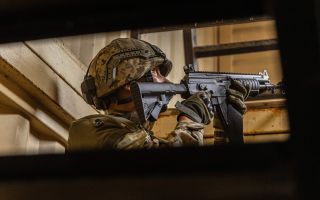 Ukrainian soldiers participate in urban assault training during Operation Interflex