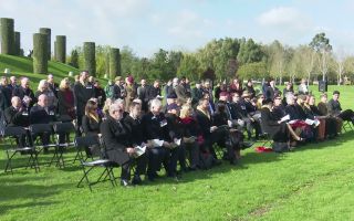 Veterans and families of loved ones gather infront of Bastion Memorial (Picture: BFBS)