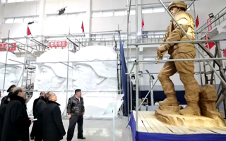Kim Jong Un inspects proposed sculptures for a memorial to North Korean troops who died fighting overseas