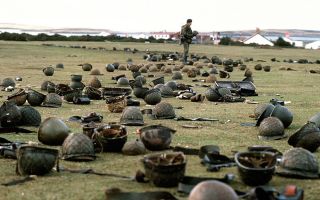 Steel helmets abandoned by Argentine armed forces who surrendered at Goose Green to British Falklands Task Force troops (Picture: PA Images)