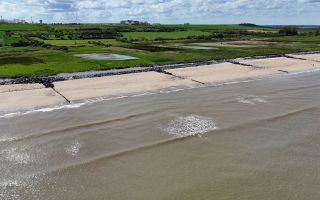A drone shot of a Normandy beach in 2024 (Picture: BFBS)