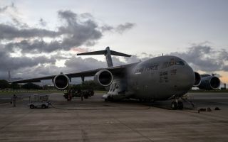 The CIA director was flown to Moscow aboard a C-17 Globemaster in order to send a clear message to Vladimir Putin, according to former military attaché John Foreman (Picture: US Department of War)