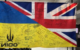 Among the items on display is a flag from the training of Ukrainian soldiers in the UK - more than 56,000 have participated in such training under Operation Interflex