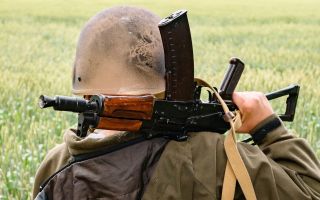 The AKS-74U - seen here being wielded by a Ukrainian soldier - has been a staple with former Warsaw Pact nations for decades, but will slowly be phased out by Russia