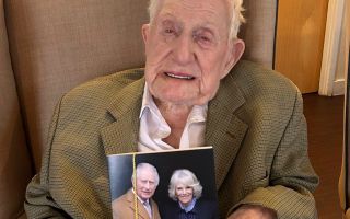 Britain's oldest man and veteran Donald Rose celebrating his 110th birthday