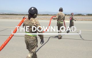 Download graphic firefighters on runway 