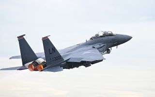 A USAF F-15E Strike Eagle assigned to the 494th Fighter Wing takes off from RAF Lakenheath