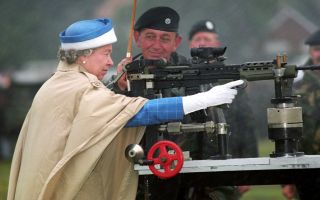  Queen Elizabeth II fires SA 80 rifle during centenary of Army Rifle Association at Bisley 090793 CREDIT PA Images, Alamy 