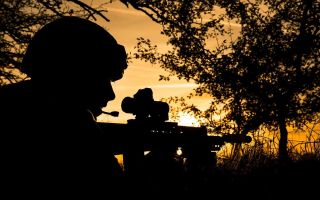 A gunner from 34 Squadron RAF Regiment takes up a defensive position