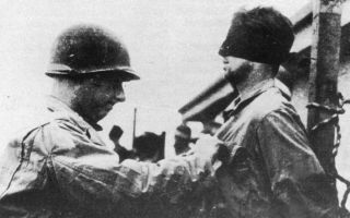 A Waffen-SS man faces death by firing squad after posing as a US soldier during the Battle of the Bulge