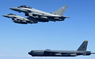 US B-52 Stratofortress pictured soaring over the Middle East with RAF Typhoons 231124 CREDIT DefenceOps X