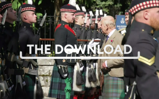 The King inspects his Royal Guard at the gates of Balmoral