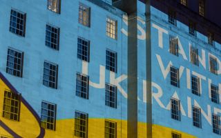 MOD's Main Building lit up with Ukrainian colours and a message of solidarity (Picture: MOD)