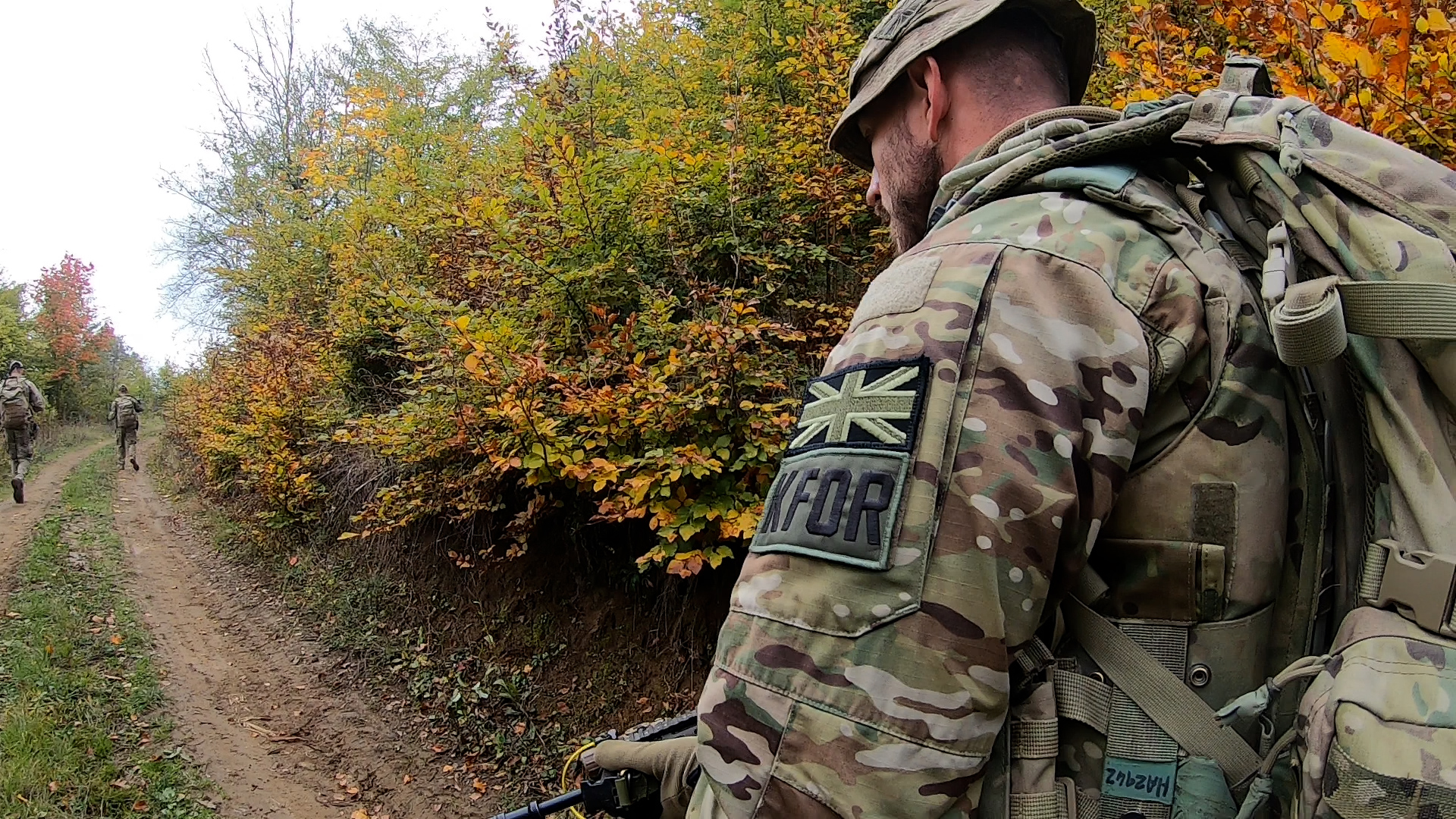 Soldier patrolling on track