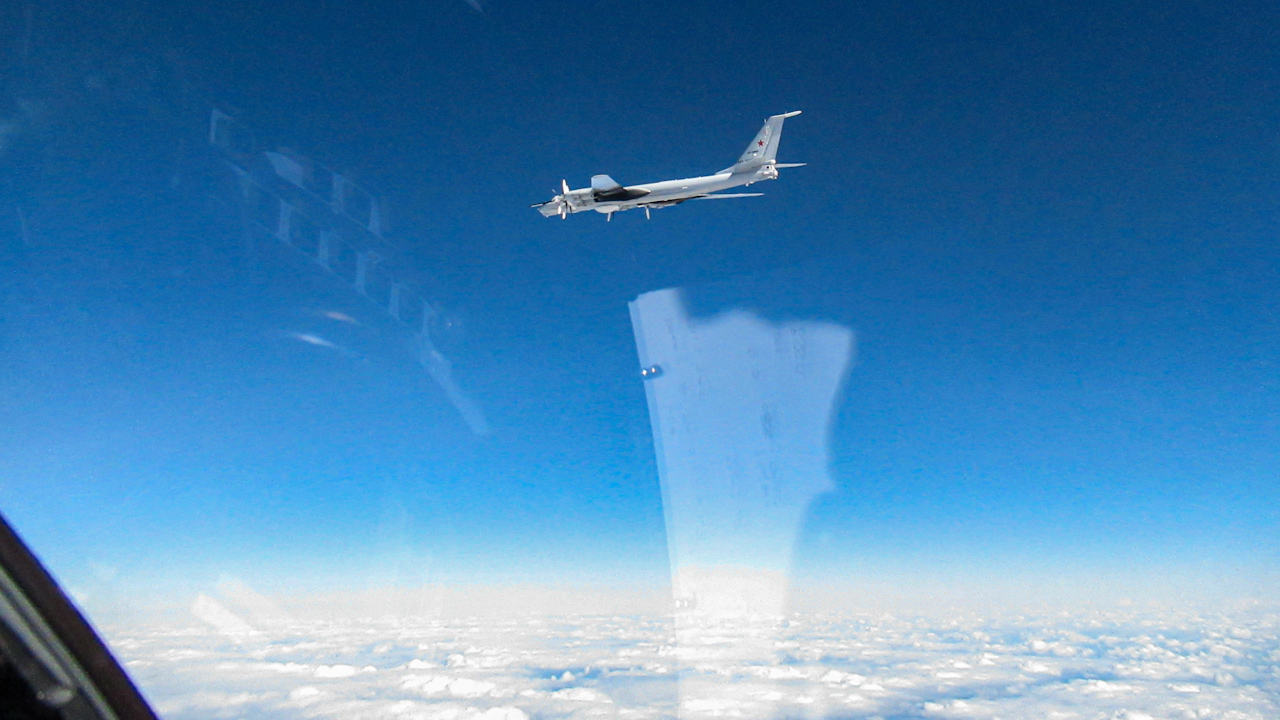 The Royal Navy and RAF were forced to intercept four Russian vessels and two aircraft (Picture: MOD QRA Intercept Bear F)