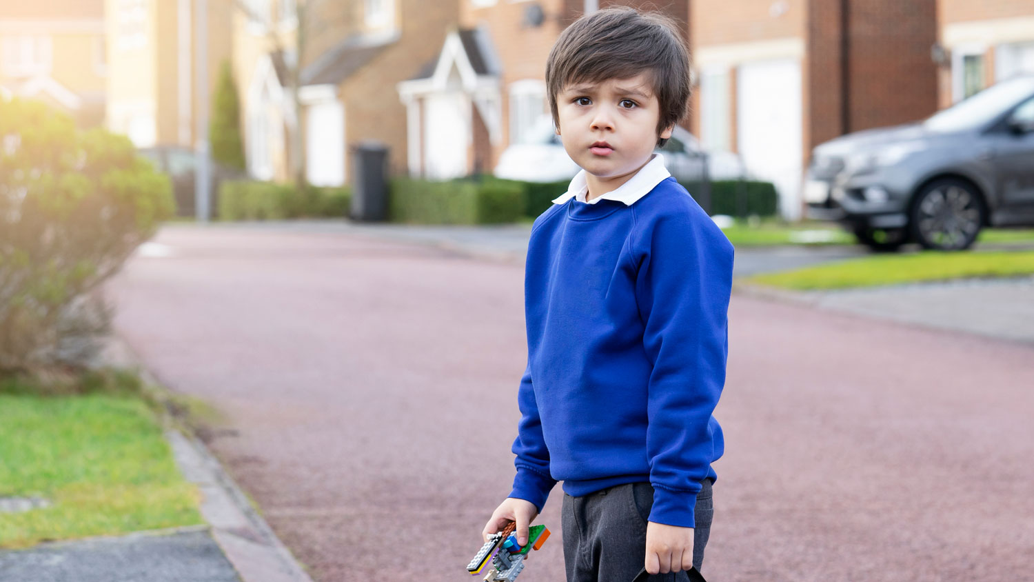 Child Anxious About Returning To School Blue Uniform Credit Shutterstock/Ann In The UK