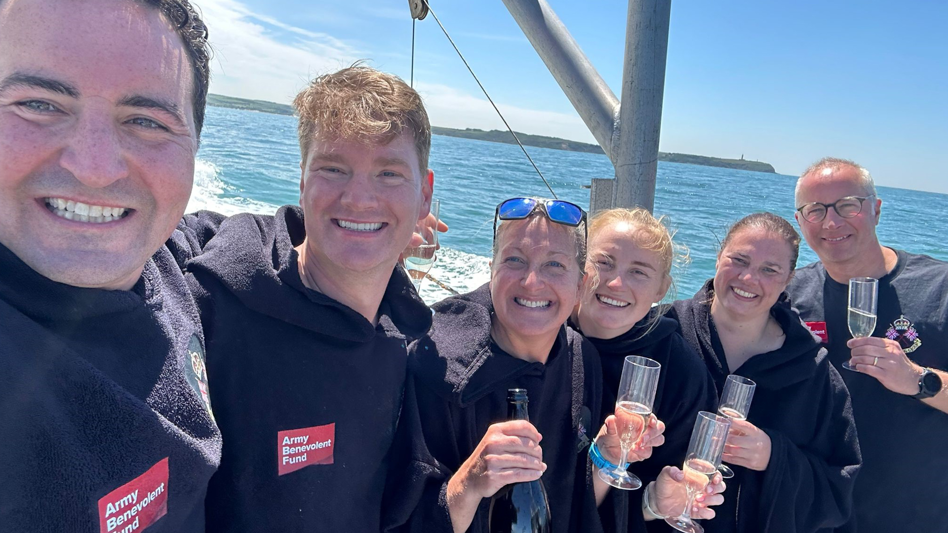 Twelve volunteers helped raise thousands of pounds for soldiers, veterans, and their families through the 26-mile swim (Picture: Army Benevolent Fund)