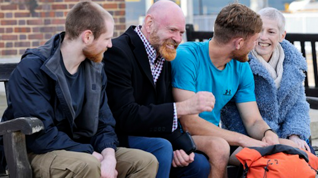 Will Matthews pictured with his family after he completed his challenge at His Majesty’s Naval Base Portsmouth (Picture: Royal Navy)
