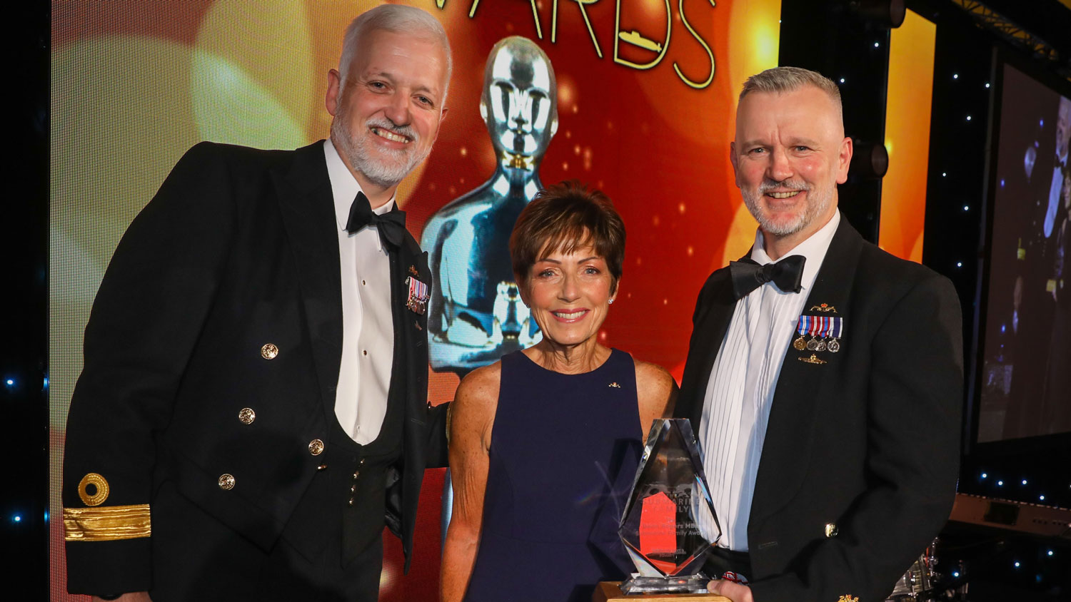 WO1 Dave Bathgate is presented the Dean Rogers MBE Submarine Family Award CREDIT Royal Navy