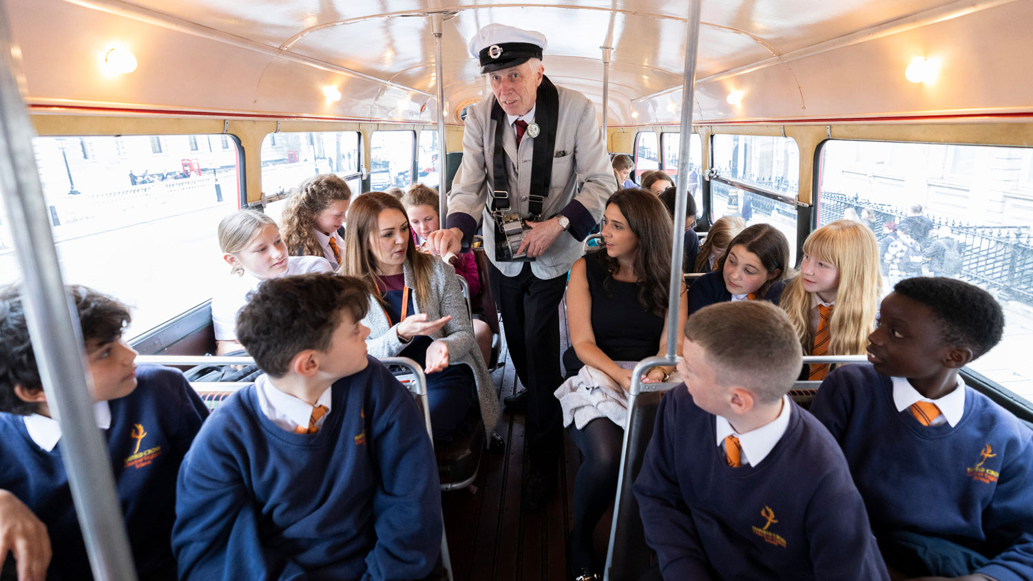 Year six children from Hayfield Cross School are seen on a D-Day themed Routemaster Bus in London on 21 May 2024 CREDIT Crown Copyright